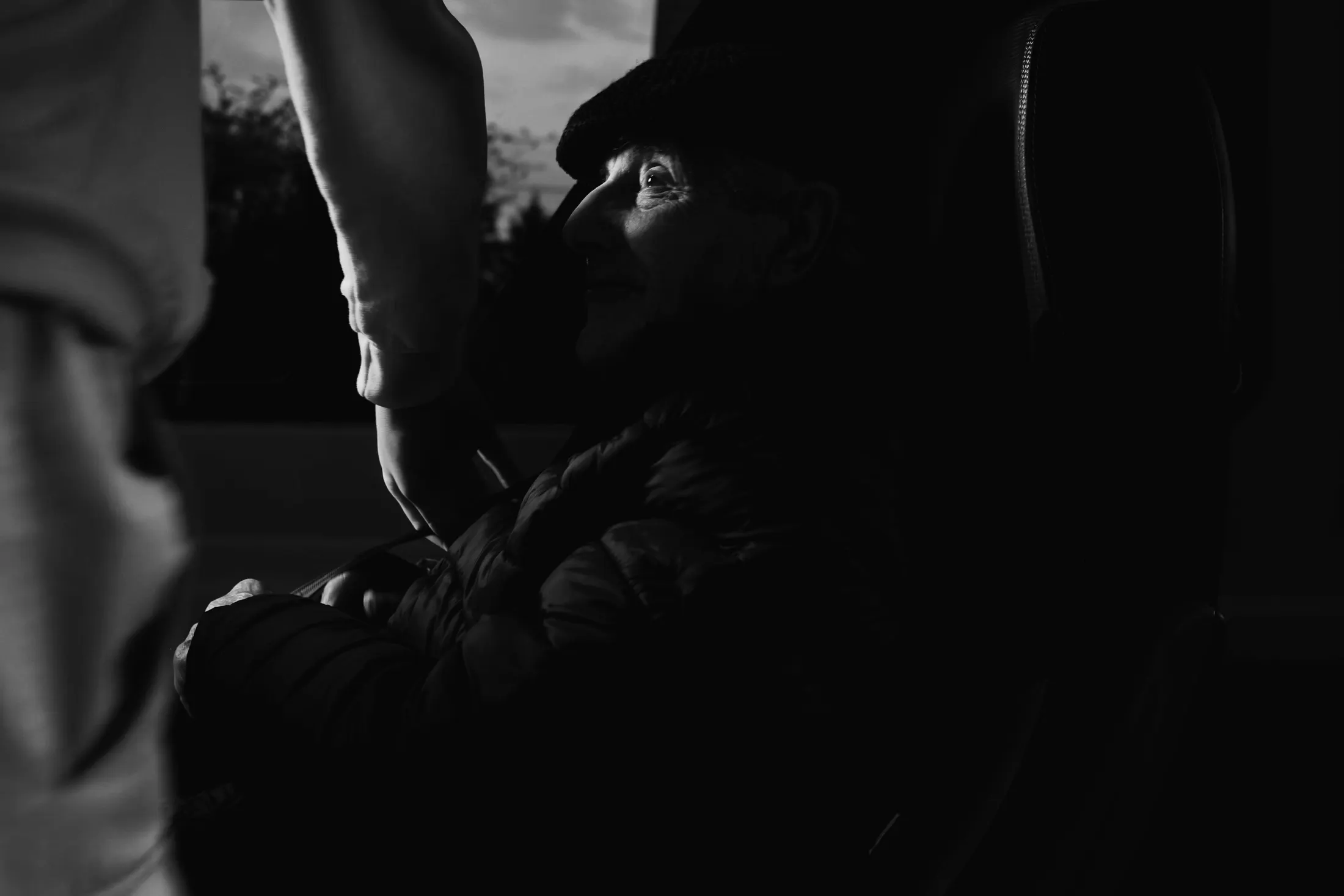 Hands touching in low light during a call-out