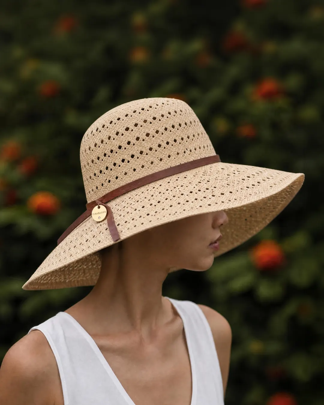 Generated image: wide-brimmed straw hat in front of a poppy field